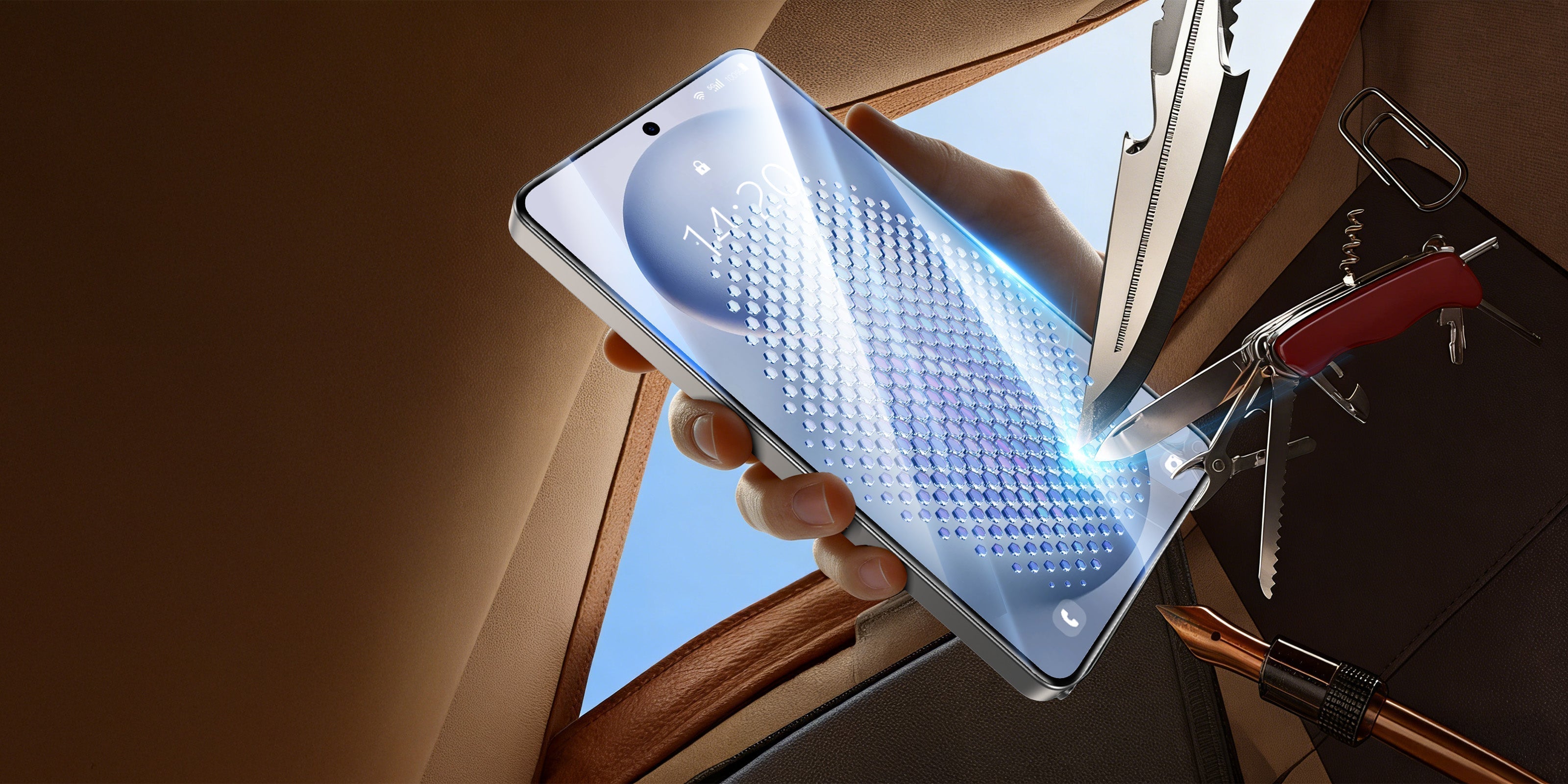 A smartphone screen demonstrating high scratch resistance against various sharp metal tools like knives and paperclips.