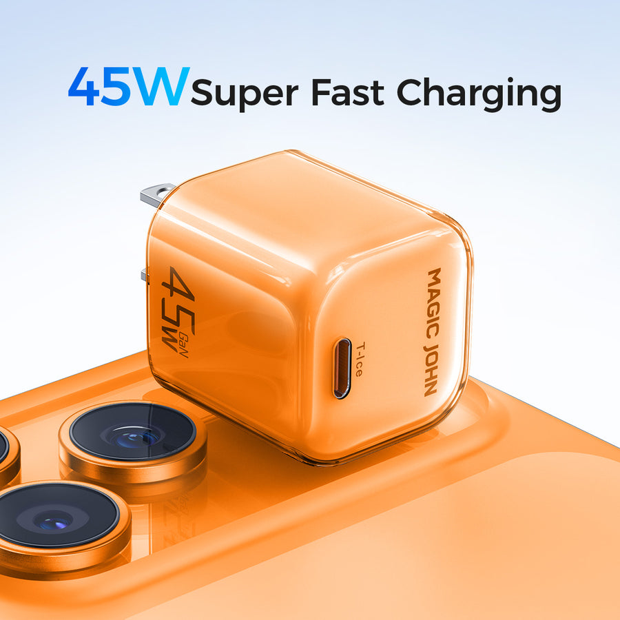 Placing a compact orange MAGIC JOHN 45W GaN charger onto a color-matched smartphone to highlight its super fast charging capabilities.