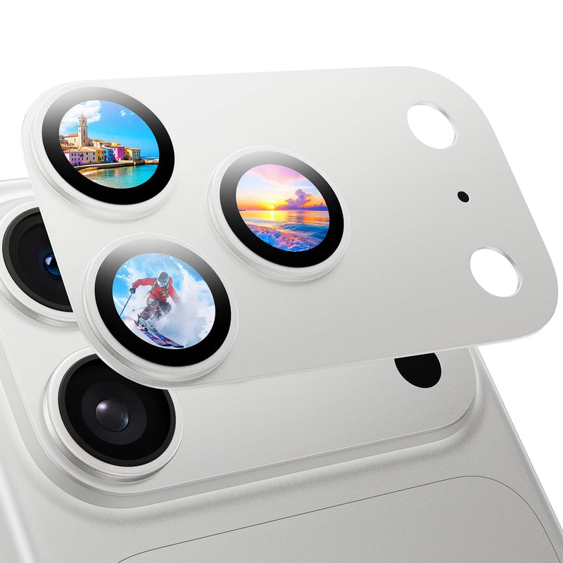 Close-up of a smartphone camera module with lens covers displaying different scenes#color_silver